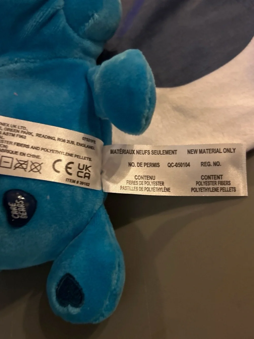 Care Bears Grumpy Bear Blue Plush with Rainbow Wrap